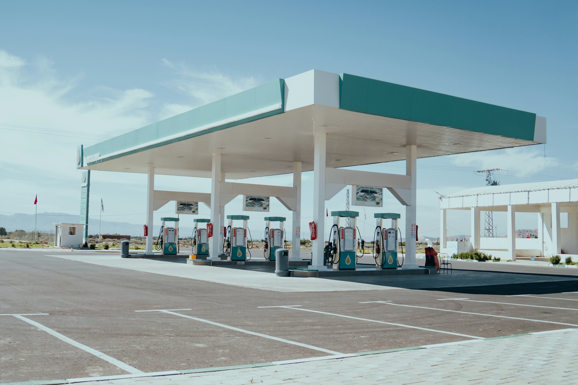 Fuel pumps under the canopy of a modern filling station